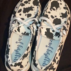 Cow print slides